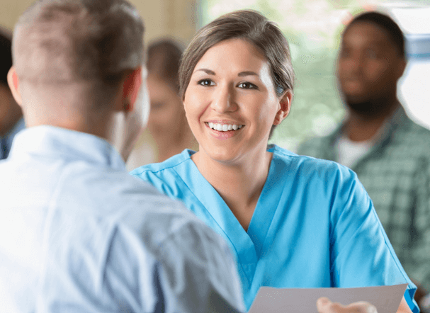 A nurse meeting with her recruiter